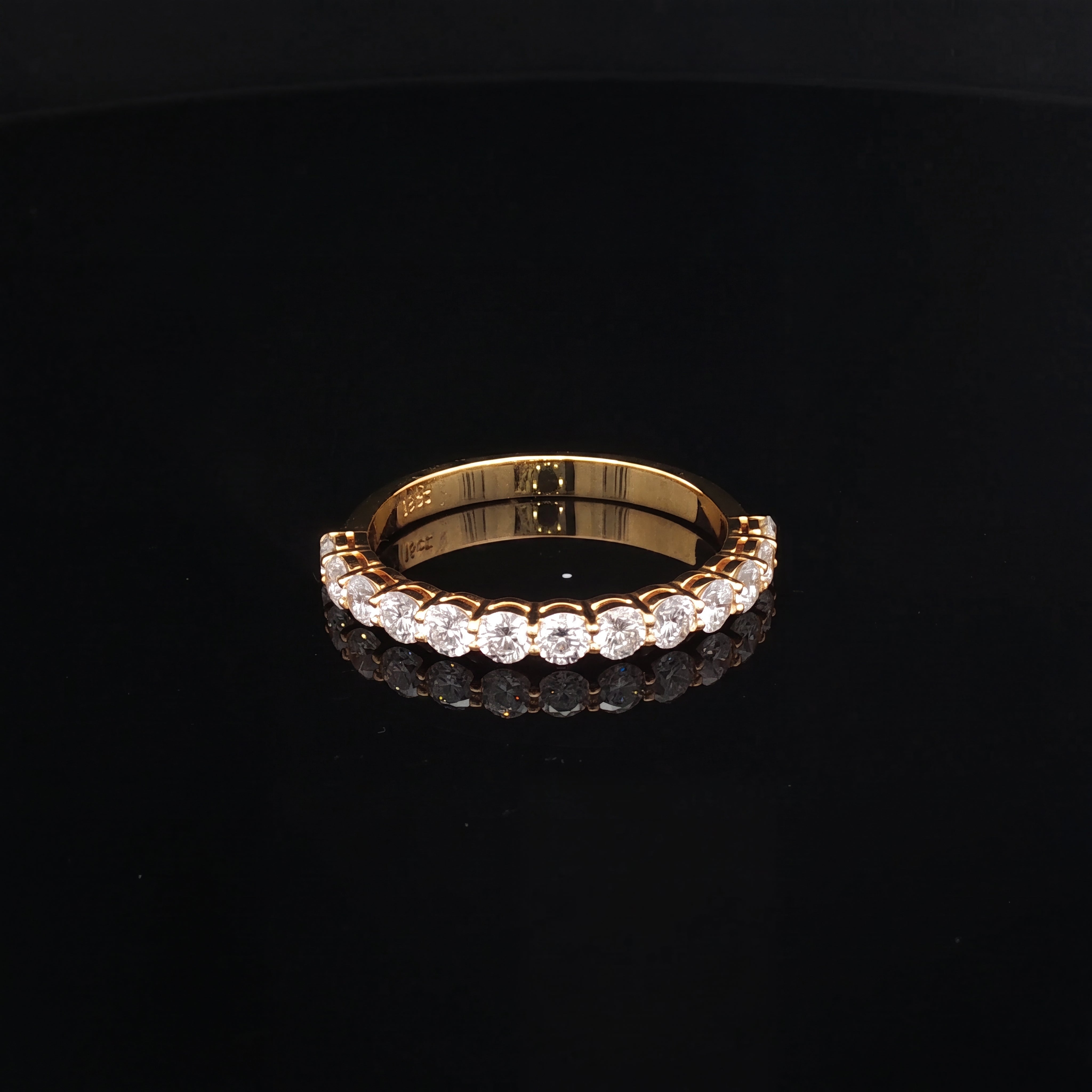Mariam – Round Diamond Claw Set Half-Eternity Band