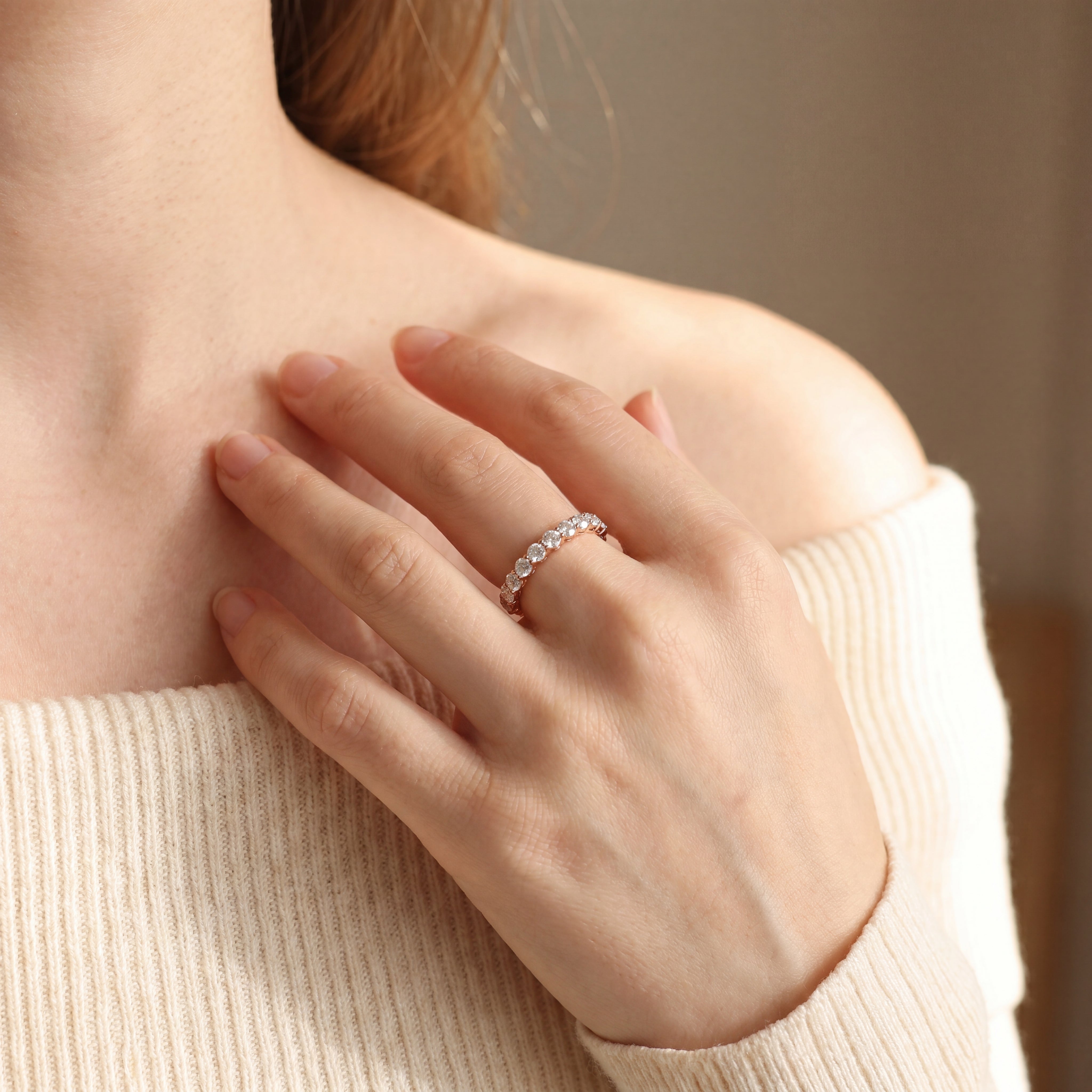 Mariam – Round Diamond Claw Set Half-Eternity Band