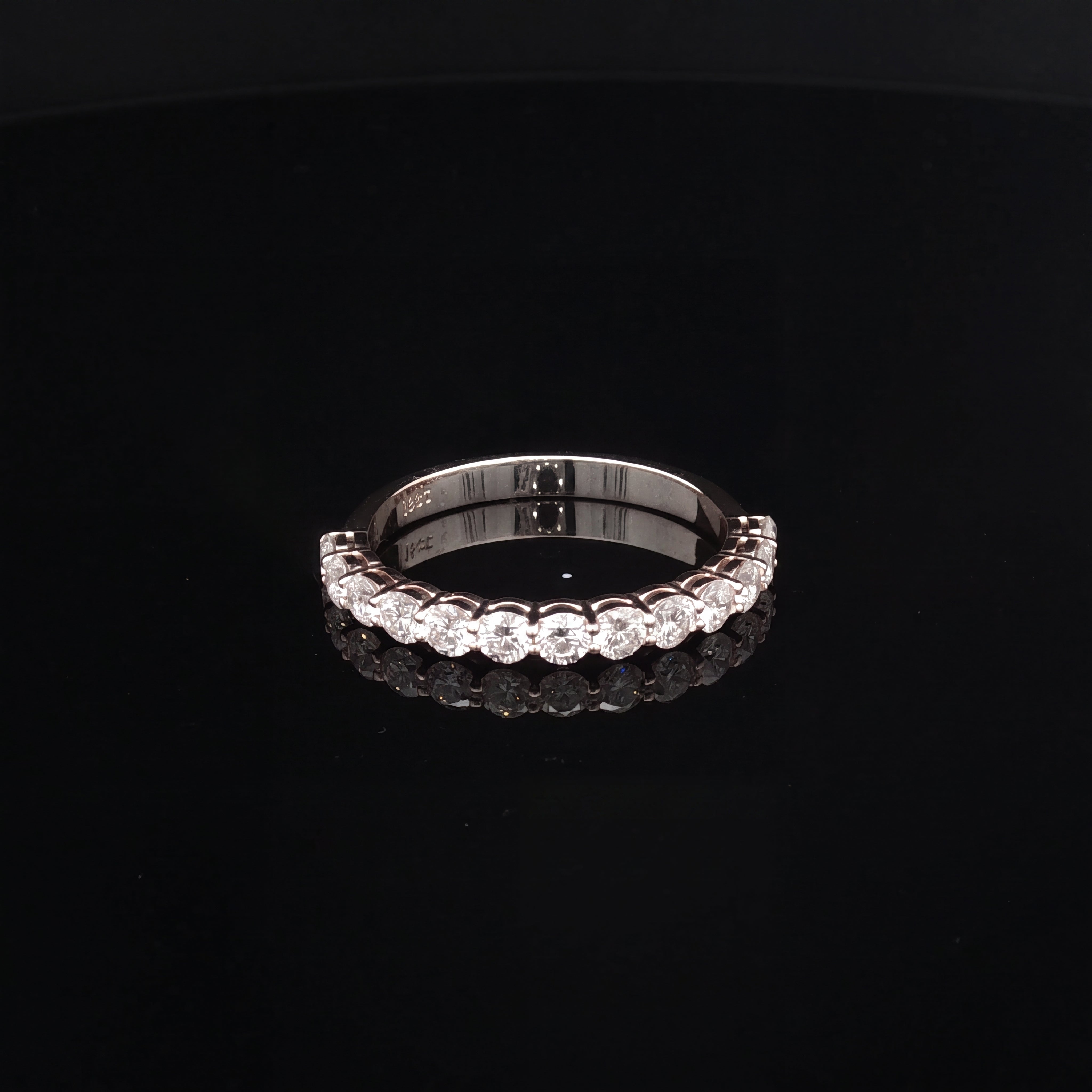 Mariam – Round Diamond Claw Set Half-Eternity Band