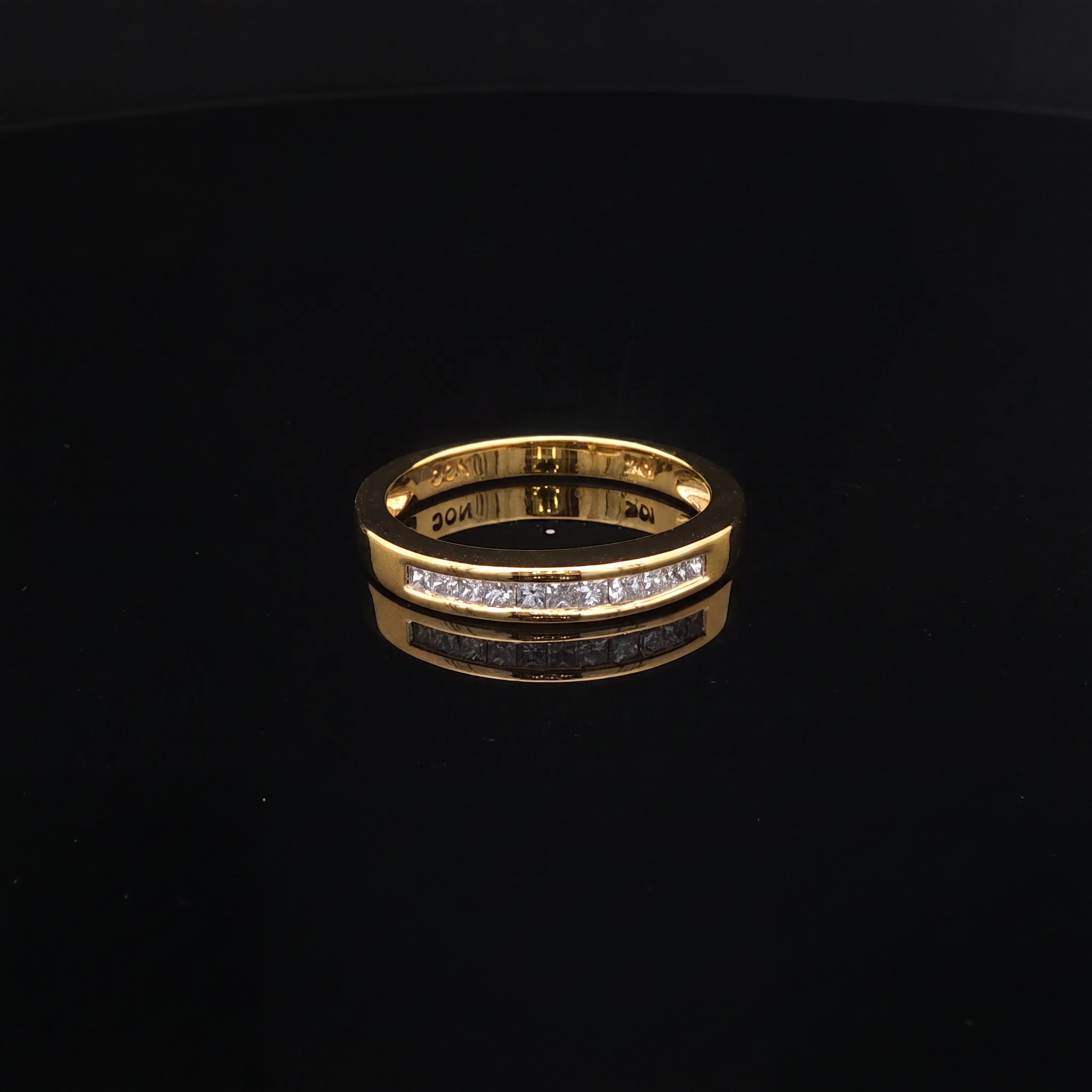 Natalia- Princess Cut Channel Set Diamond Band