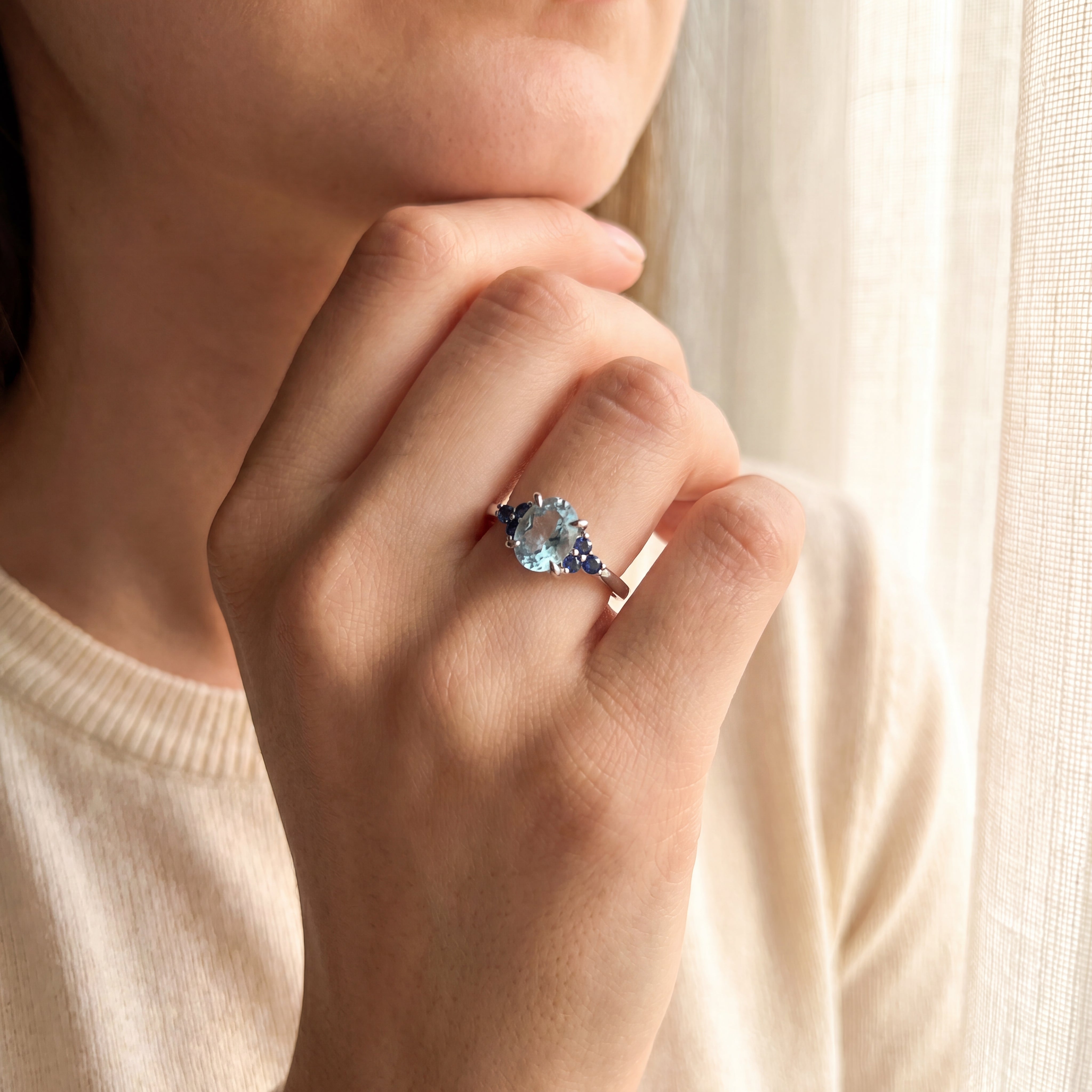 Nerissa - Oval Blue Topaz Three-Stone Ring in White Gold