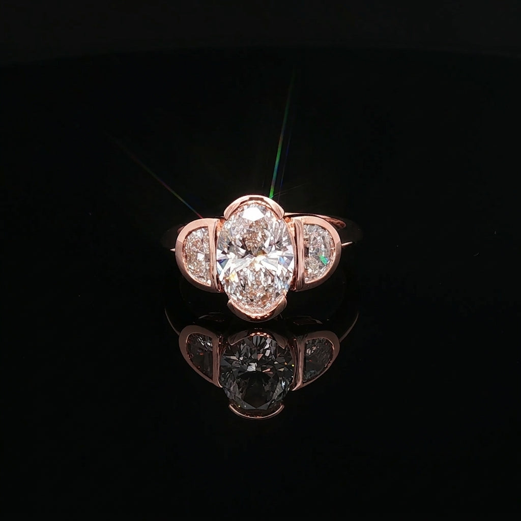Sevilla - Oval Diamond Three-Stone Bezel Ring