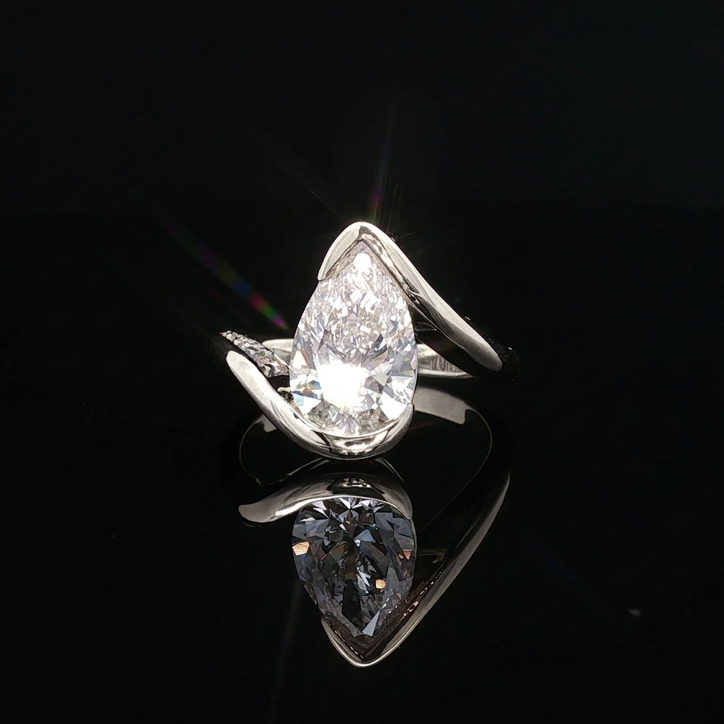 Positano - Pear-Shaped Diamond Bypass Solitaire Ring