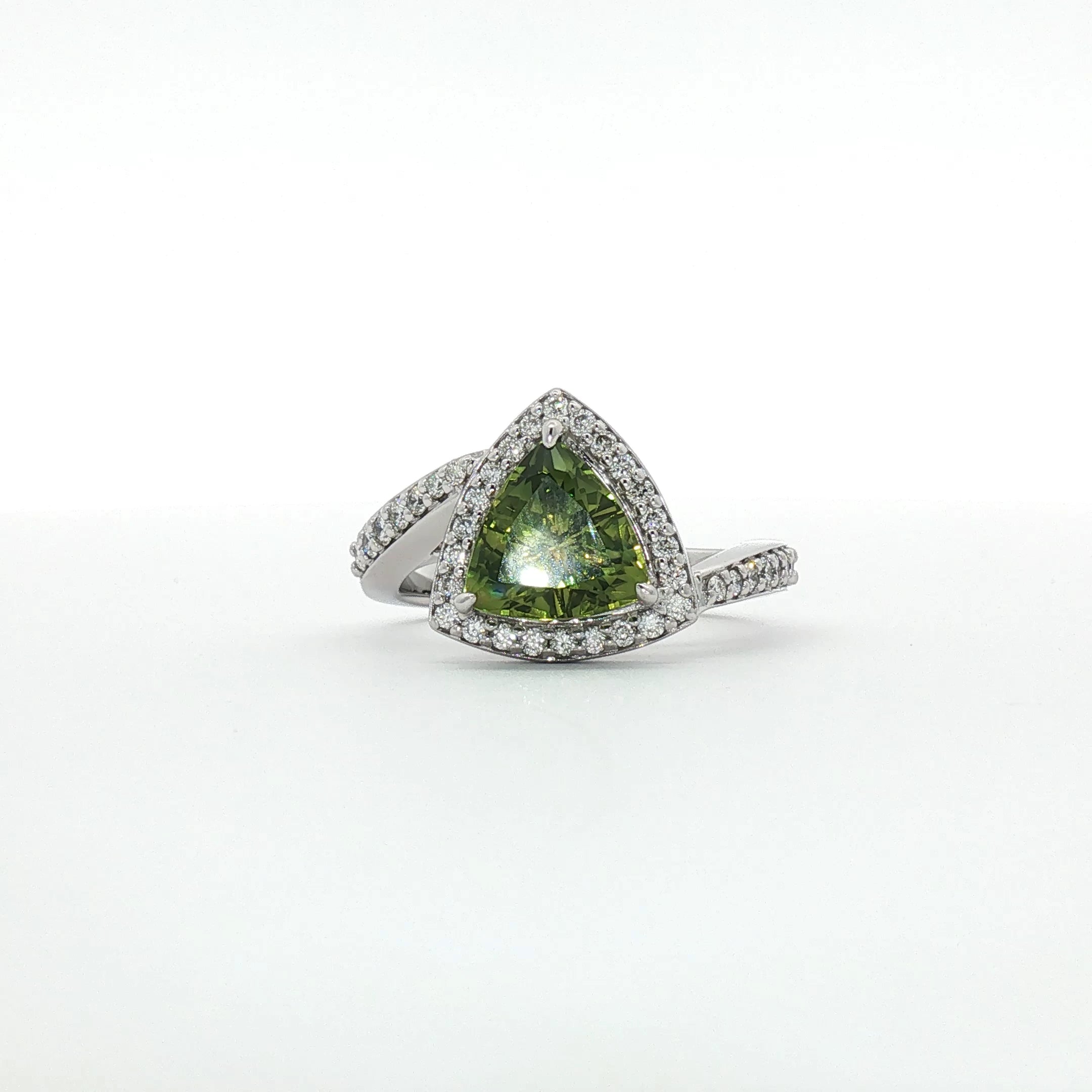 Nerissa - Oval Blue Topaz Three-Stone Ring in White Gold